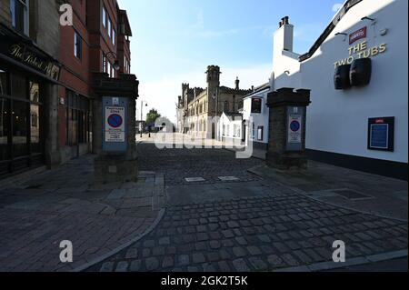 Strada laterale nel centro della città di Bury, Manchester Foto Stock