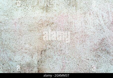 Sfondo o struttura della parete verniciata in calcestruzzo fessurato. Primo piano Foto Stock