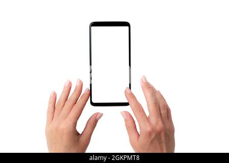 Smartphone nero con schermo bianco nelle mani Foto Stock