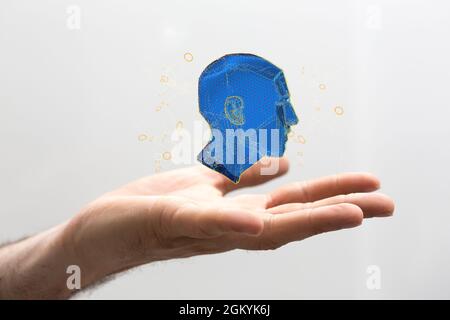 rendering 3d di una testa umana con una struttura plessica di rete in una mano su sfondo bianco Foto Stock