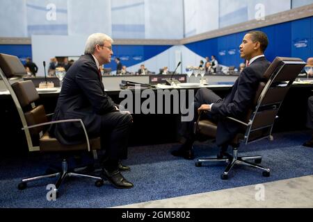 Il presidente Barack Obama e il primo ministro australiano Kevin Rudd partecipano al pranzo dei leader durante il G-20 Pittsburgh Summit al David L. Lawrence Convention Center di Pittsburgh, Penn., 25 settembre 2009. (Foto ufficiale della Casa Bianca di Pete Souza) questa fotografia ufficiale della Casa Bianca è resa disponibile solo per la pubblicazione da parte delle organizzazioni di notizie e/o per uso personale la stampa dal soggetto(i) della fotografia. La fotografia non può essere manipolata in alcun modo e non può essere utilizzata in materiali commerciali o politici, pubblicità, e-mail, prodotti, promozioni che in qualsiasi modo suggerisce un Foto Stock