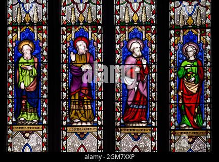 Gli Evangelisti vetrate, St. Michael and All Angels Church, Hallaton, Leicestershire, Inghilterra, Regno Unito Foto Stock