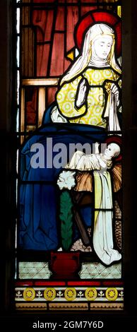 Maria con il bambino Gesù vetrate, Chiesa di San Giles, Blaston, Leicestershire, Inghilterra, REGNO UNITO Foto Stock