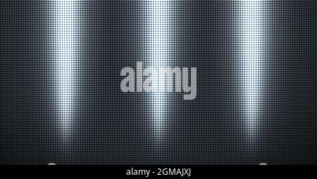 Piastra metallica forata con luce spot. Primo piano su sfondo metallico Foto Stock