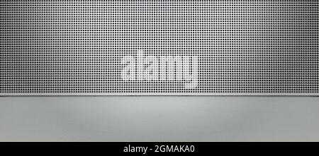 Piastra metallica forata con luce spot. Primo piano su sfondo metallico Foto Stock