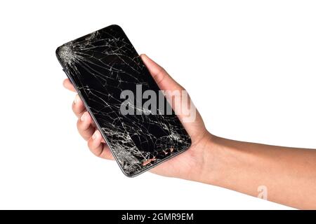 Smartphone rotto in mano isolato su sfondo bianco con tracciato di ritaglio Foto Stock
