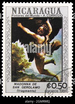 MOSCA, RUSSIA - 6 NOVEMBRE 2019: Francobollo stampato in Nicaragua mostra Ganymede rapito dall'Aquila, serie Correggio, circa 1984 Foto Stock