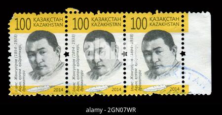 3 PCS SET Stamp stampato in Kazakhstan mostra l'immagine dell'Ilyas Zhansugurov, circa 2014. Foto Stock