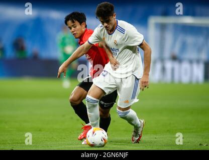 Madrid, Spagna. 22 settembre 2021. Miguel Gutierrez del Real Madrid e Takefusa Kubo di Maiorca durante la lega spagnola, la Liga Santander, partita di calcio disputata tra Real Madrid e RCD Mallorca allo stadio Santiago Bernabeu il 22 settembre 2021, a Madrid, Spagna. Foto Oscar J. Barroso/Spagna DPPI/DPPI - Foto: Oscar Barroso/DPPI/LiveMedia Credit: Independent Photo Agency/Alamy Live News Foto Stock