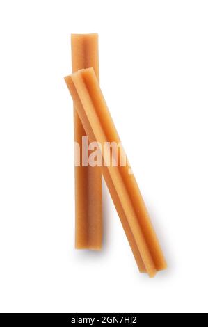 Studio di cane dentale masticare tagliato su uno sfondo bianco - John Gollop Foto Stock