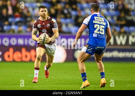 John Bateman (13) di Wigan Warriors in azione Foto Stock