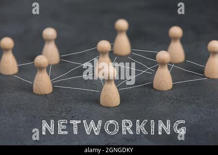Group of people connecting through a web, business networking and communication Foto Stock