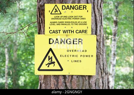 Cast con attenzione segno di pericolo per il pescatore Foto Stock