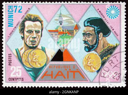 HAITI - CIRCA 1972: Un francobollo stampato ad Haiti mostra Viren e Milburn, vincitori della medaglia d'oro, Giochi Olimpici estivi 1972, Monaco, circa 1972 Foto Stock