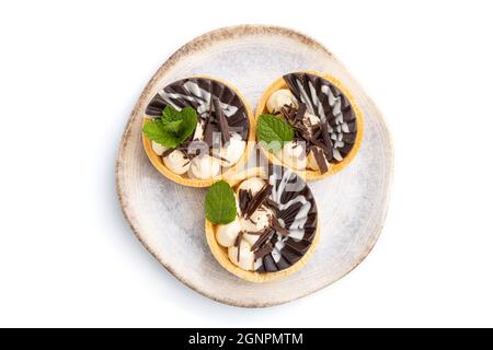 Tartine dolci con cioccolato e crema di formaggio isolato su sfondo bianco. Vista dall'alto, piatto, primo piano. Foto Stock