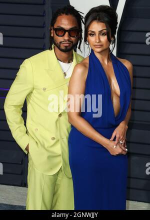 (FILE) Miguel e Nazanin Mandi si separano dopo 17 anni insieme. La coppia, che datò 10 anni prima di essere ingaggiata nel 2016, si sposò all'Hummingbird Nest Ranch a Simi Valley, California, nel novembre 2018. BEVERLY HILLS, LOS ANGELES, CALIFORNIA, USA - 24 FEBBRAIO: Il cantante Miguel e la moglie/attrice Nazanin Mandi arrivano al Vanity Fair Oscar Party 2019 che si tiene presso il Wallis Annenberg Center for the Performing Arts il 24 febbraio 2019 a Beverly Hills, Los Angeles, California, Stati Uniti. (Foto di Xavier Collin/Image Press Agency) Foto Stock