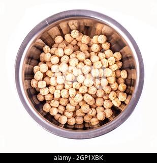 Mucchi di bambini di grano intero pallido sul piatto Foto Stock