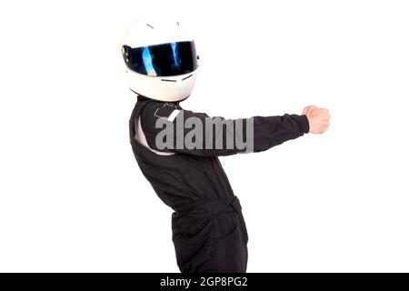 Racing driver in posa con casco isolato in bianco Foto Stock