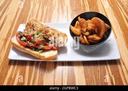 Deliziosa cucina americana conosciuta come il Philly Cheesesteak Foto Stock