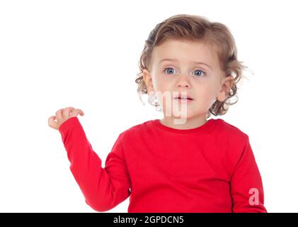 Bambino sorpreso con gli occhi blu isolato su uno sfondo bianco Foto Stock