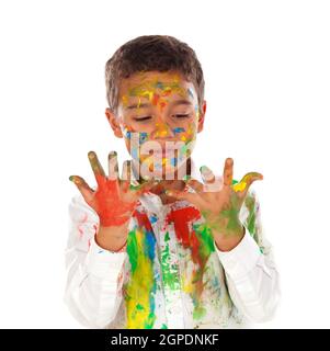 Ragazzo divertente con le mani e il viso pieno di vernice isolati su sfondo bianco Foto Stock