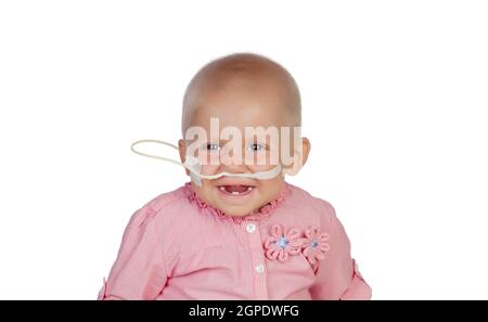 Adorable baby con un velo battendo la malattia Foto Stock