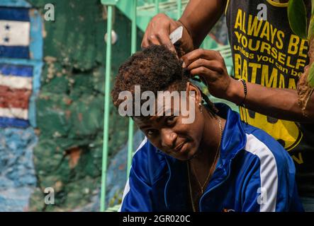 Non esclusiva: I migranti haitiani riposano durante il loro soggiorno a Hostel Tochan, una fondazione che sostiene i migranti nel loro viaggio attraverso il Messico per l'ONU Foto Stock