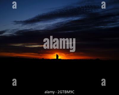 Silhouette di sunrise Foto Stock