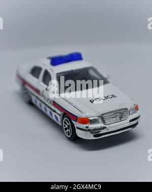 Auto giocattolo della polizia in stile anni '90 Foto Stock