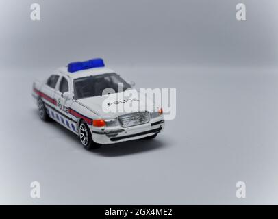 Auto giocattolo della polizia in stile anni '90 Foto Stock