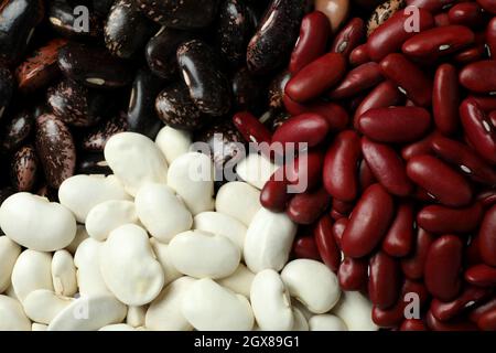Diversi tipi di fagioli, su tutto il fondo Foto Stock