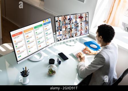 African American Business Woman in Video Conference Foto Stock