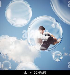 Un uomo d'affari triste vola in una bolla, isolarsi all'interno di una bolla distacco dal concetto di mondo esterno Foto Stock