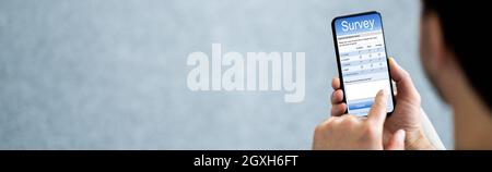 Sondaggio del questionario online Compilazione del modulo di feedback Foto Stock