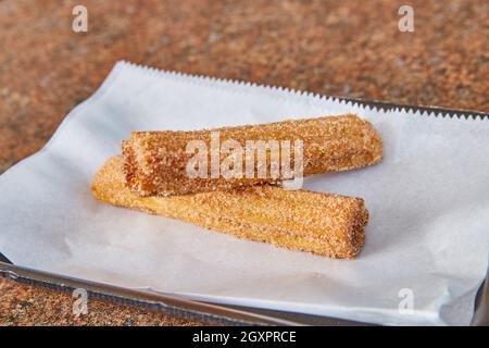 Churro messicano coperto di zucchero Foto Stock