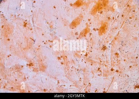 Texture di roccia da vicino con macchie rosa e arancione Foto Stock
