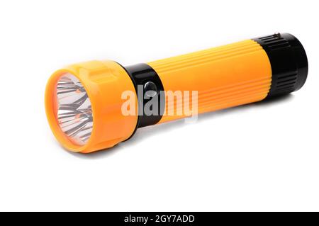 Torcia LED gialla con possibilità di ricarica dalla rete elettrica su uno sfondo bianco isolato Foto Stock