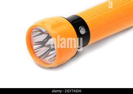 Torcia LED gialla con possibilità di ricarica dalla rete elettrica su uno sfondo bianco isolato Foto Stock