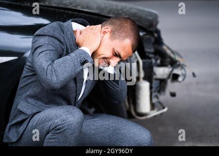 Incidente auto Whiplash. Dolore dopo incidente automatico Foto Stock