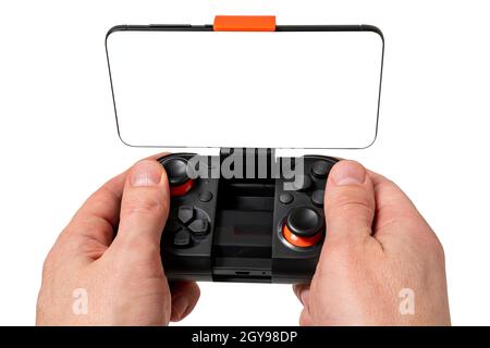 Game Pad con smartphone a mani isolate su sfondo bianco. Concetto di gioco mobile. Foto Stock