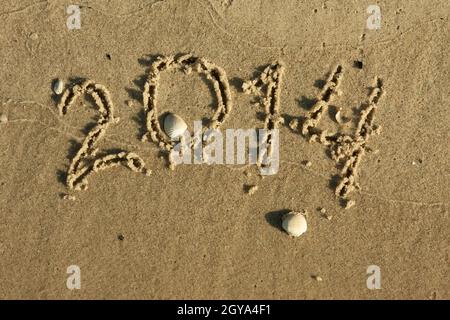 L'iscrizione sulla sabbia 2014, può essere utilizzata come sfondo Foto Stock