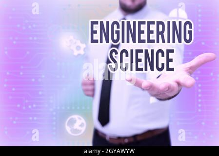 Cartello di testo che mostra Engineering Science, Business Concept trattare con fisica e matematica base di ingegneria Gentelman Uniform Standing Holding NE Foto Stock