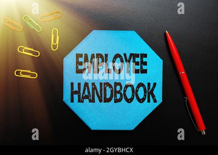 Sign visualizzazione Employee Handbook, Business idea dichiara le regole e le politiche di un'azienda pensando nuove idee brillanti rinnovare Creativ Foto Stock