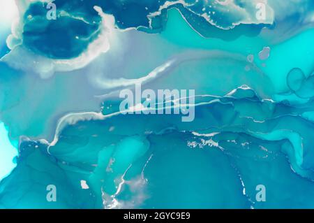 Acque turchesi dell'oceano. Inchiostro alcool su carta. Foto Stock