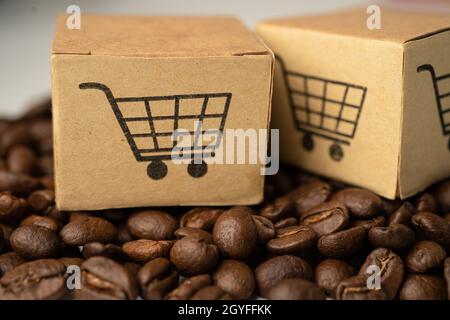 Scatola con il simbolo del logo del carrello della spesa sui chicchi di caffè, Import Export Shopping online o servizio di consegna eCommerce Store spedizione del prodotto, commercio, scorte Foto Stock