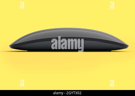 Mouse nero realistico con touch isolato su sfondo giallo. Rendering 3D del trackpad wireless per laptop per l'ufficio domestico e lo spazio di lavoro Foto Stock