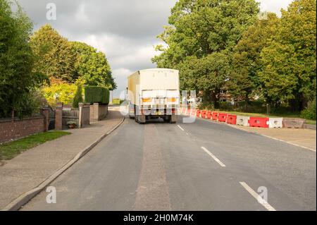 Autocarri che lasciano la fabbrica di barbabietole da zucchero di Cantley dopo aver ribaltato il carico di barbabietole da zucchero Foto Stock