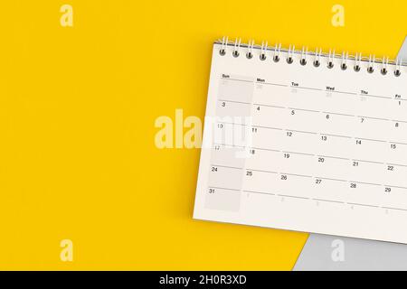 Pagina del calendario su sfondo a colori. Pianificazione aziendale Foto Stock