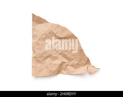 Torn piece paper sheet, blank damaged paper, brown triangle part of cardboard as package, isolated on white, top view Foto Stock