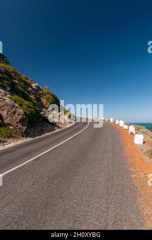 Una strada vuota che conduce a Capo di buona speranza Città del Capo occidentale Sud Africa Foto Stock